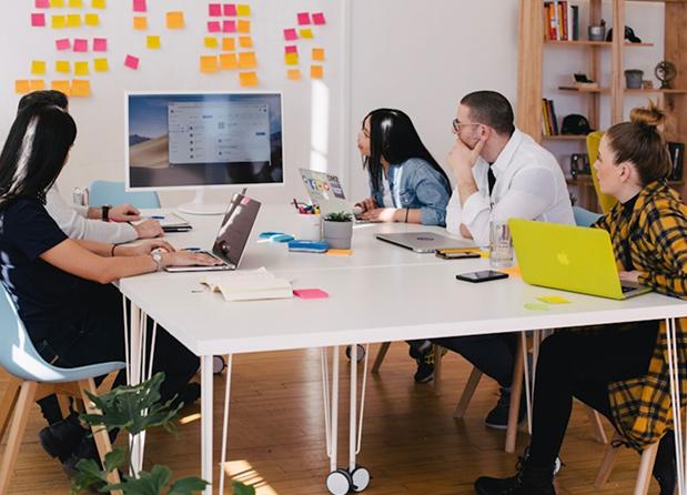 Team working together around a table